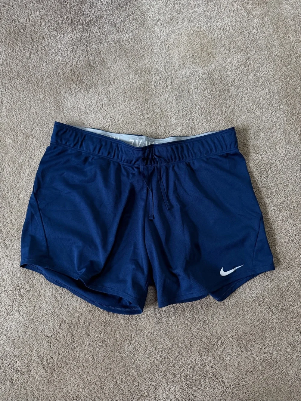 Nike Women’s Dark Blue Athletic Shorts with White Swoosh